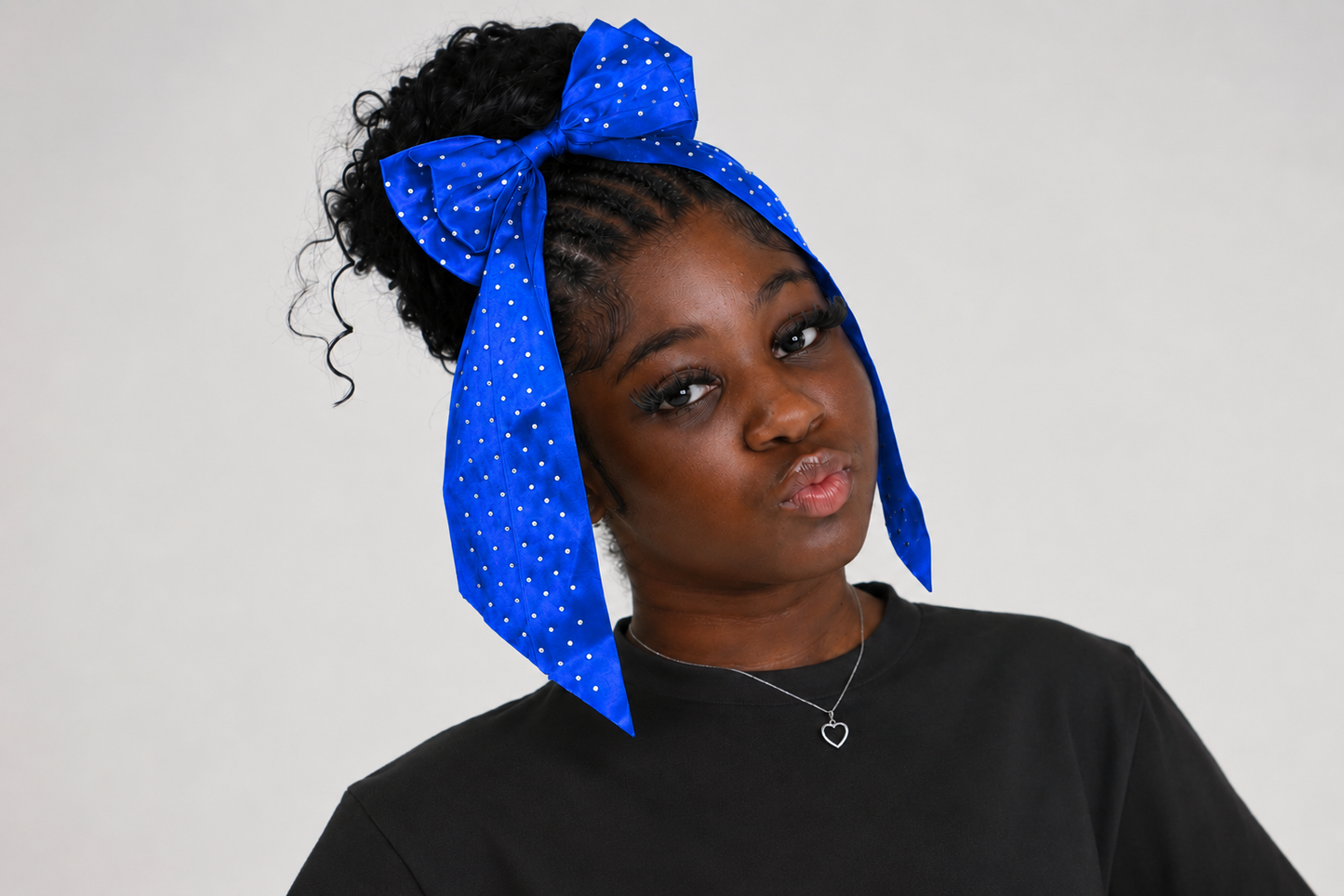 Blue bow accessory from Starr Girls' Pretty Girl Club featuring a vibrant, stylish hair bow for girls.