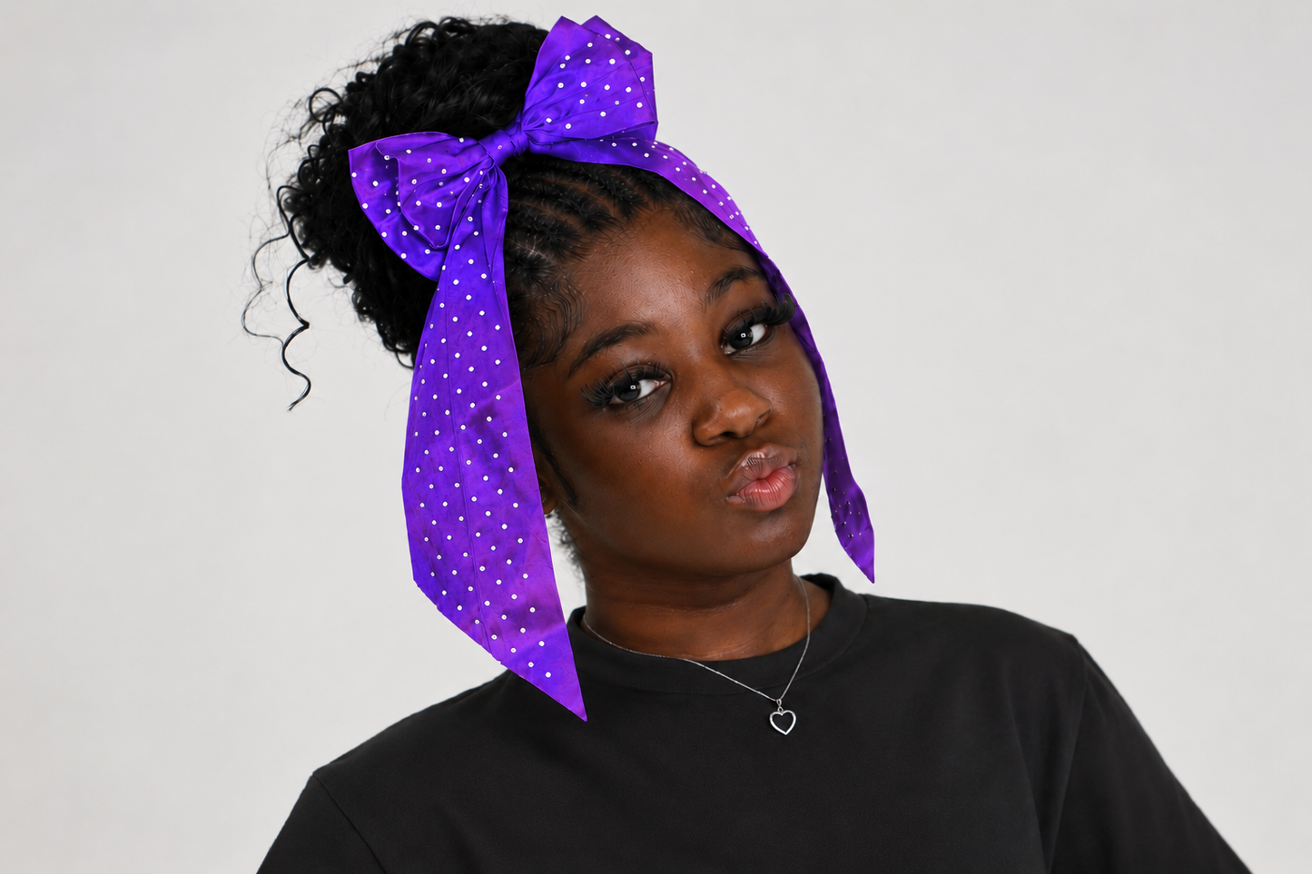 Purple bow hair accessory for girls from Starr Girls Pretty Girl Club collection, featuring a charming, decorative bow.